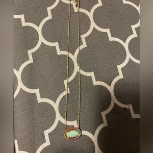 Kendra Scott necklace.